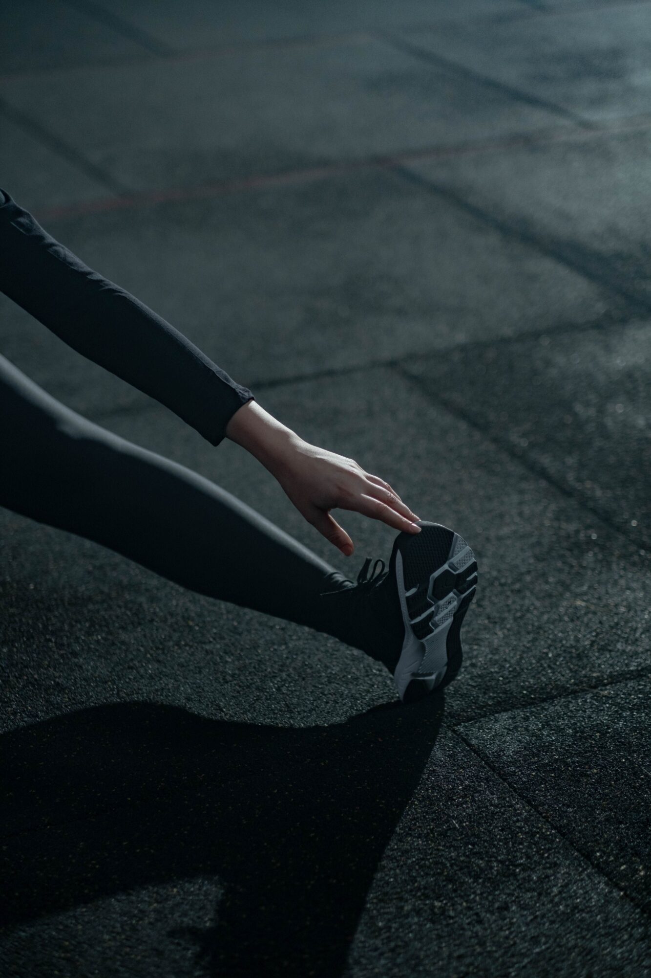Athlete stretching and considering BPC-157 Peptide for use.
